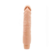 Dildo vibrante Soft Skin rosa carne vista frontale con base piatta a righe verticali