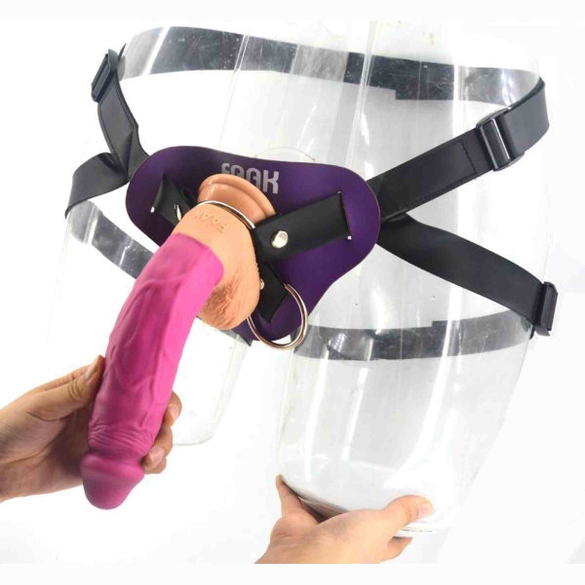 Strap-on rosa acceso con supporto viola e logo FNAK